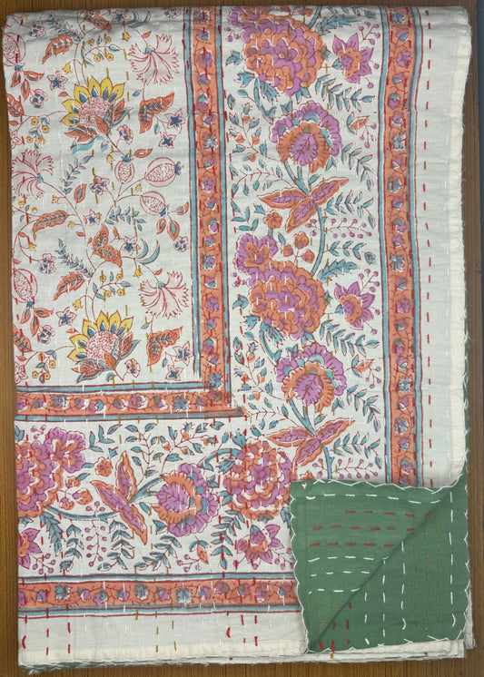 Floral patterned fabric on a wooden surface