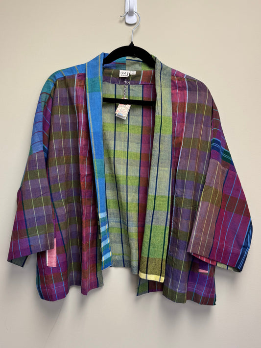 Plaid jacket on a beige background