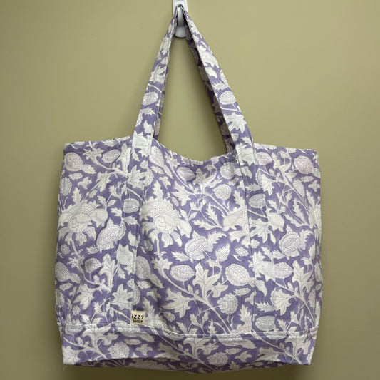 Floral-patterned bag on a beige background